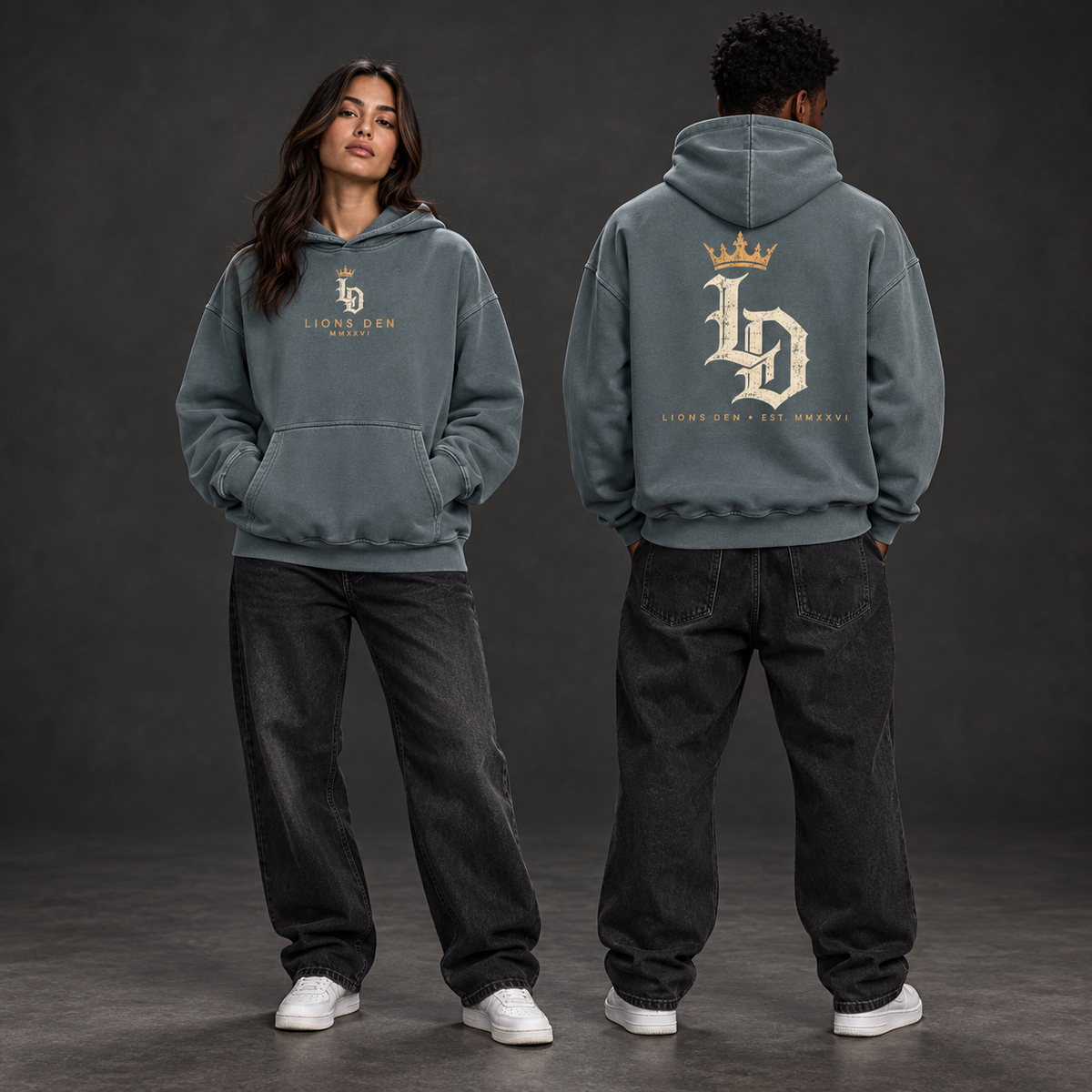 Two models wearing the Gray Blue Lions Den Crowned Gothic LD heavyweight vintage-wash hoodie, shown from the front and back