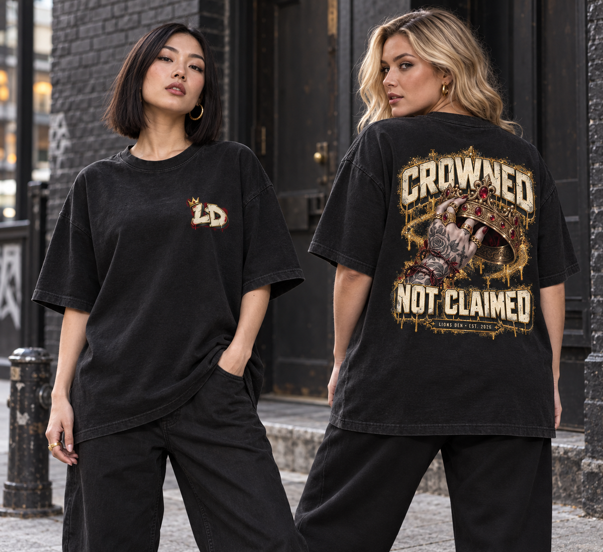 Women modeling the Lions Den Crowned Not Claimed oversized streetwear tee