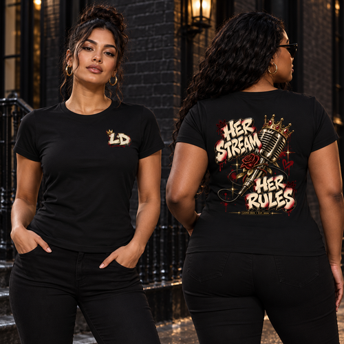 Two women modeling the black Lions Den Her Stream Her Rules slim-fit tee, showing the crowned LD front mark and full back artwork