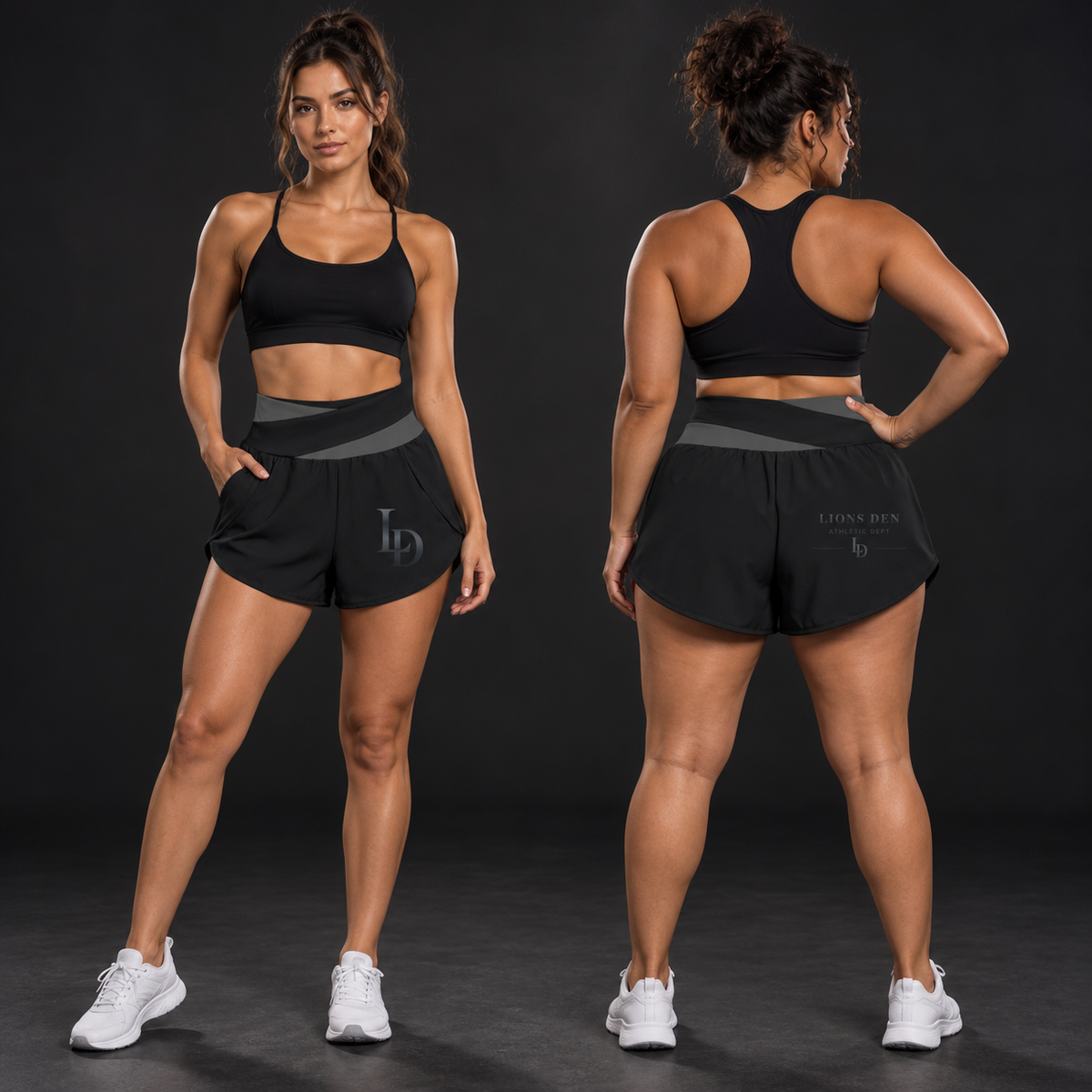 Two women model the black and dark-gray LD Athletic Dept color-block training shorts, showing the front monogram and back department mark.