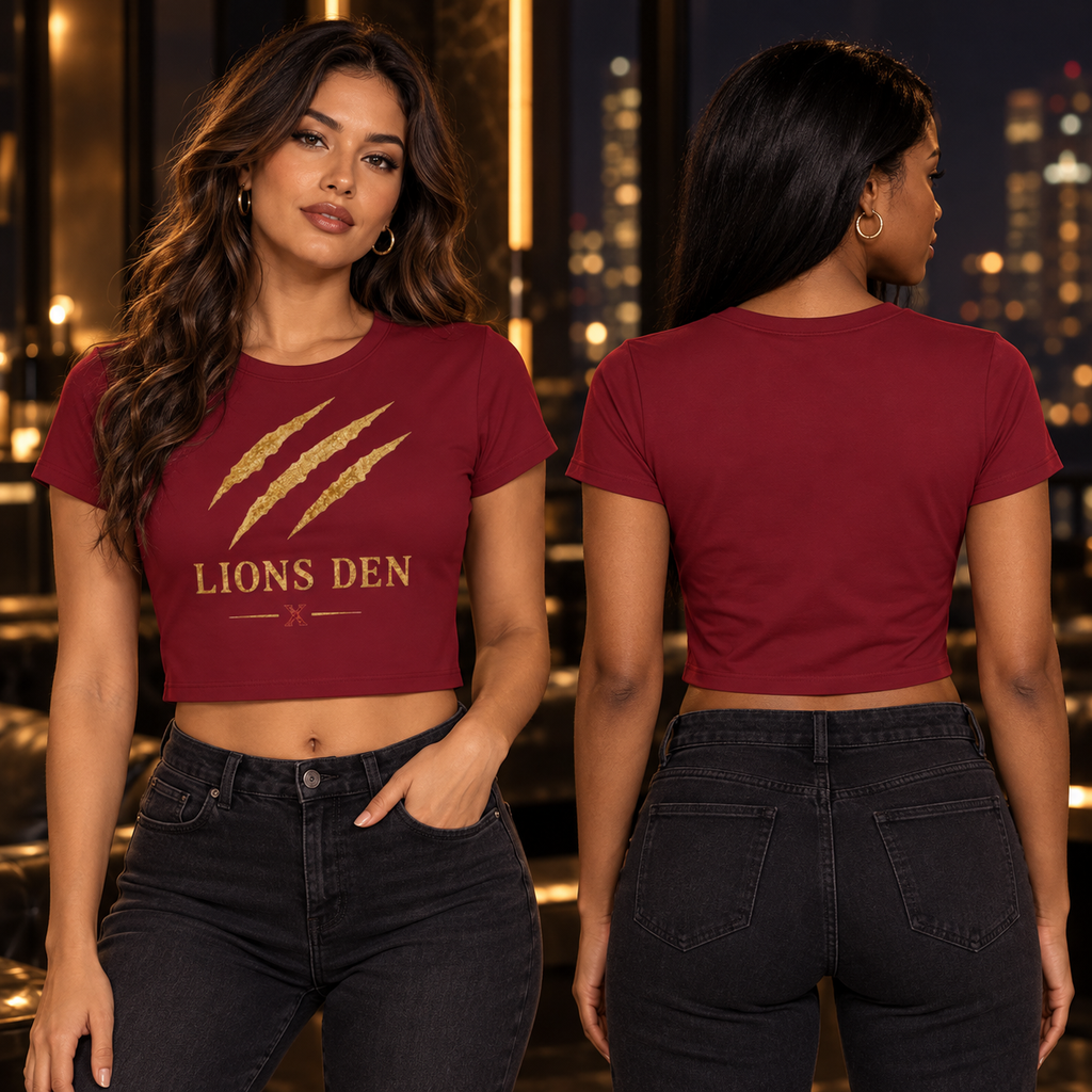 Two women model the oxblood Lions Den scratch-mark cropped tee, shown from the graphic front and blank back.