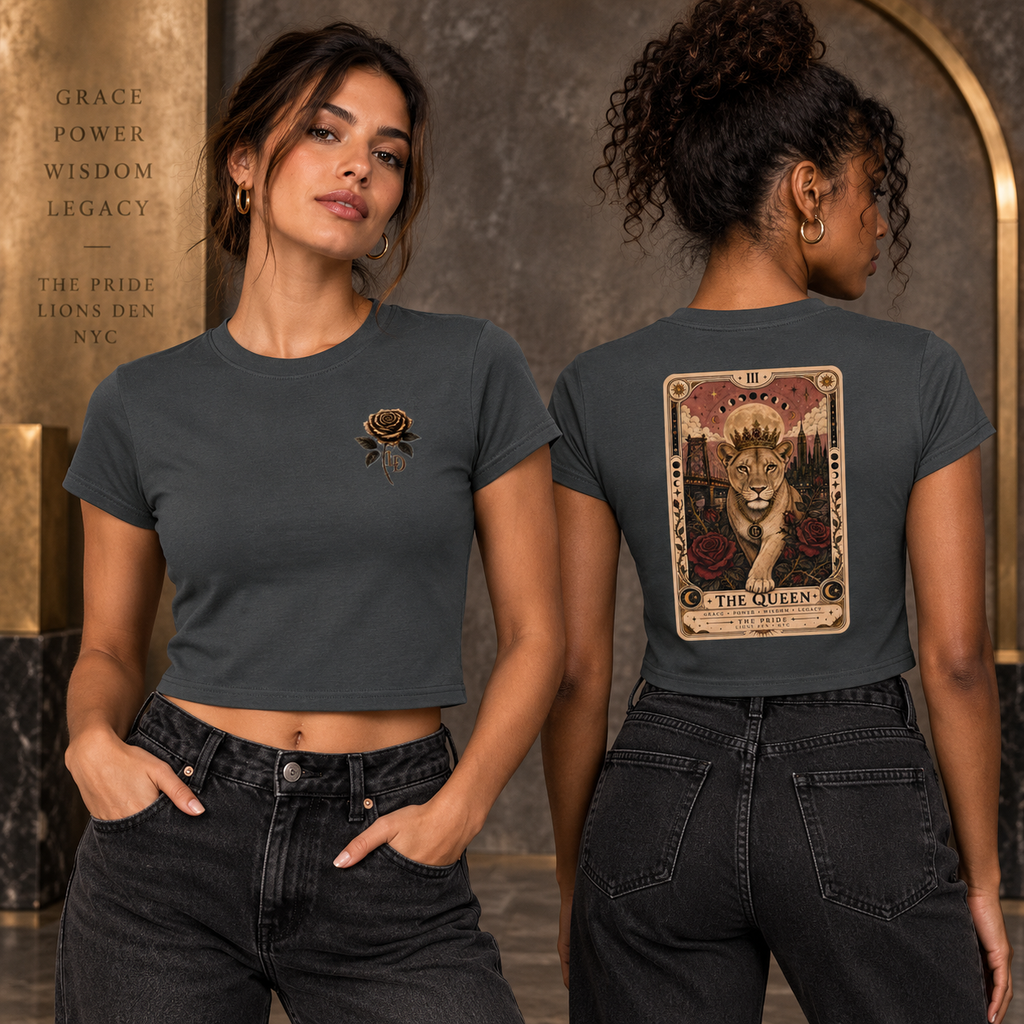 Two women model the charcoal Lions Den The Queen lioness cropped tee, showing the rose chest emblem and tarot-style back artwork.