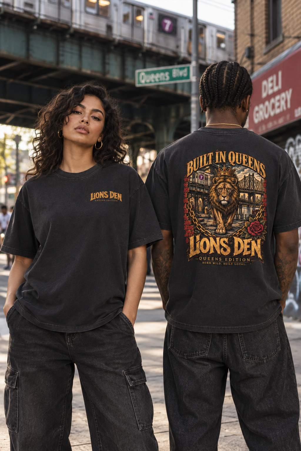 Two models wearing the Lions Den Built in Queens vintage washed tee