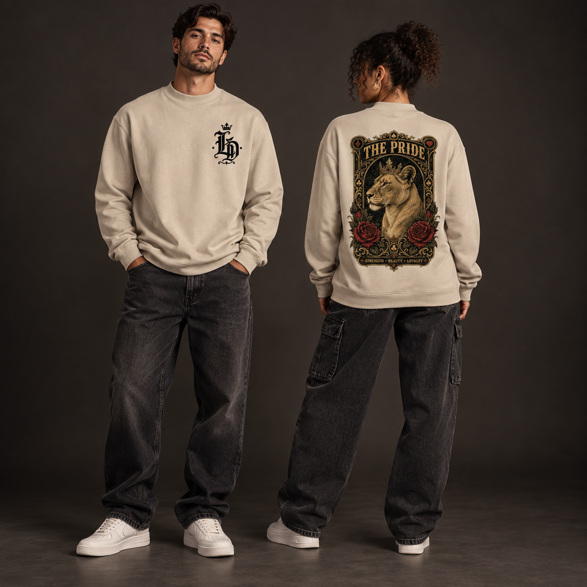 Two models wearing the beige Lions Den The Pride Lioness mock-neck sweatshirt, shown from the front and back